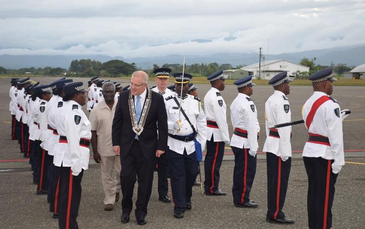 The Australian prime minister Scott Morrison inspecting a guard of honor by the Royal Solomon Islands Police Force upon his arrival in the capital Honiara. 2 June 2019