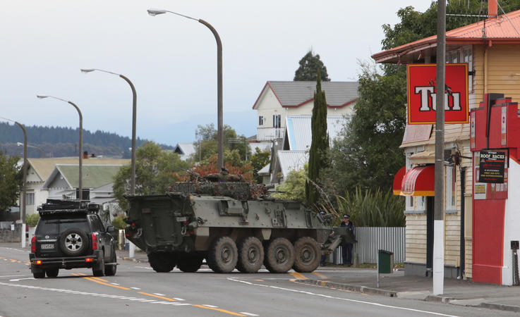A Defence Force LAV (light armoured vehicle) heads up Chaucer Road during the Napier Siege.