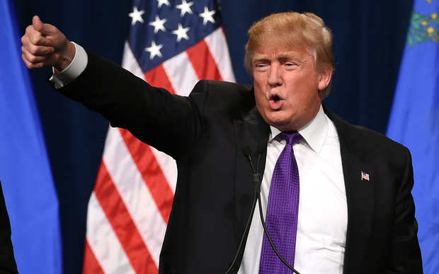 Donald Trump speaks at a caucus night watch party at the Treasure Island Hotel & Casino in Las Vegas, Nevada.