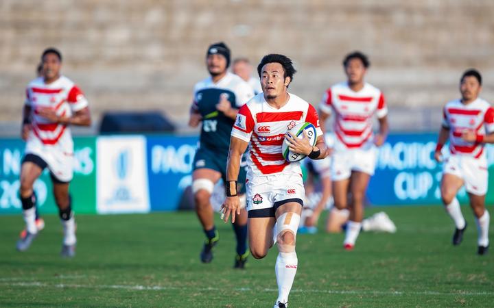 Japan wing Kenki Fukuoka races away to score against the USA in Suva