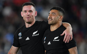 New Zealand's Ryan Crotty with Richie Mo'unga after their 23-13 victory at theRugby World Cup.