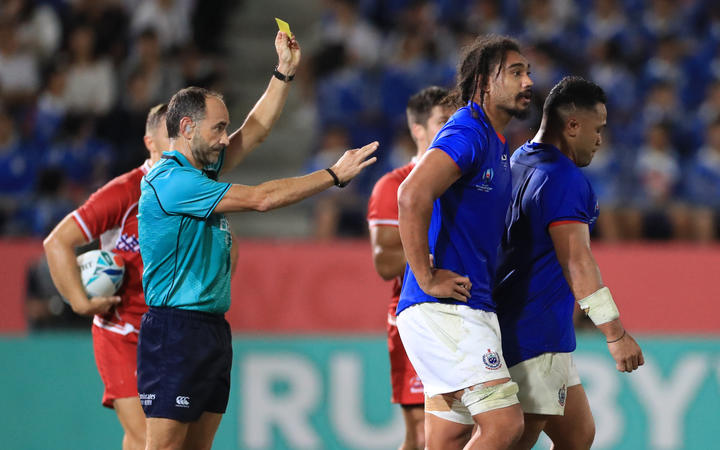 Samoa's Motu Matu'u (R) failed a concussion test after being yellow carded.
