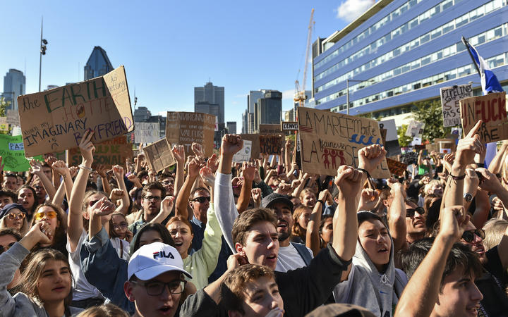Young activists and their supporters rally for action on climate change in Montreal.