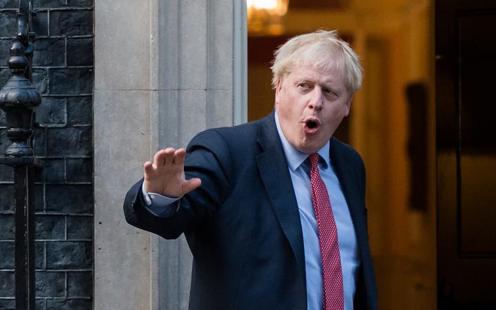 British Prime Minister Boris Johnson stands on the steps of 10 Downing Street ahead of the meeting with European Parliament President David Sassoli (not pictured) on 08 October 2019 in London, England. (Photo by WIktor Szymanowicz/NurPhoto)