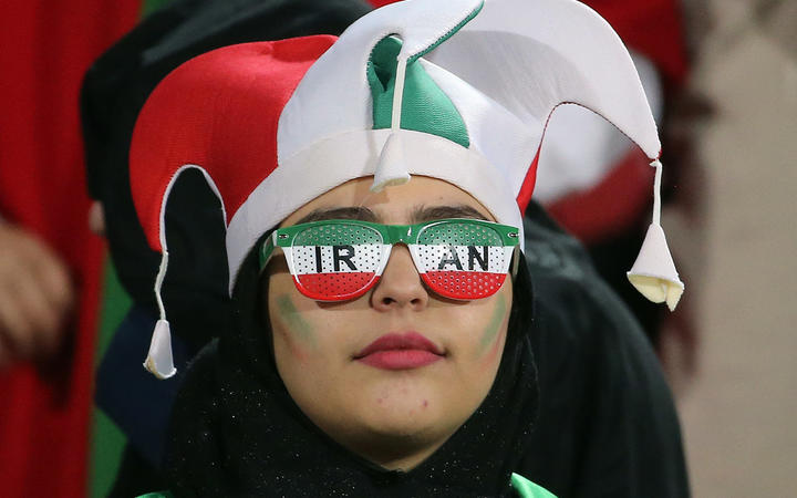 A female football fan at Iran's World Cup qualifier against Cambodia, in Teheran.  Iran has barred female spectators from football and other stadiums for around 40 years.