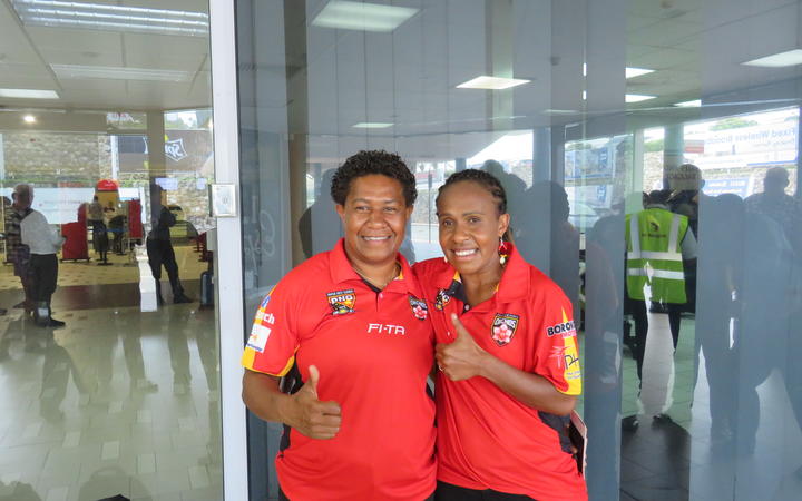 Orchids co-captains Janet John (left) and Angela Watego 