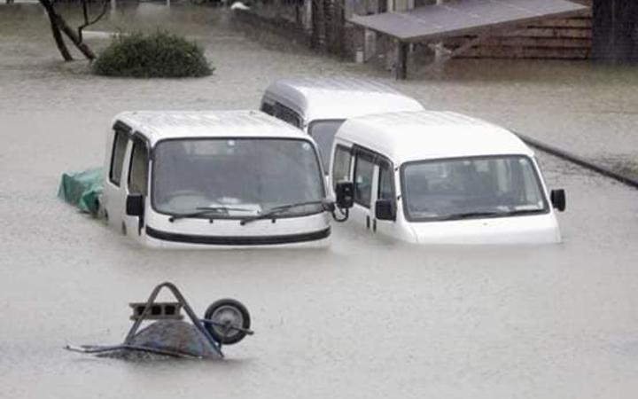 Vehicles submerged in water in Noda City, Chiba.