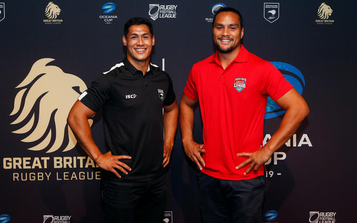 NZ's Roger Tuivasa-Sheck (left) and Tonga's Leivaha Pulu pose before Saturday's triple-header