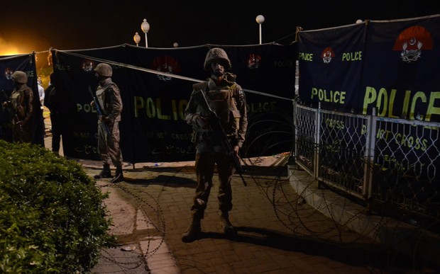 Security forces at the explosion site after a suicide bomber blew himself up in a crowded park in Lahore on Easter Sunday.