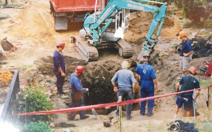An old photo Daveena Dawrant has collected shows her garden dug up and remediation works, where an abandoned well was discovered.