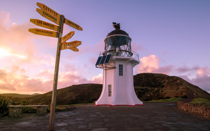 Cape Reinga, north edge of New Zealand, Tasman sea and Pacific oceans meet here. Beautiful seascape with lighthouse.