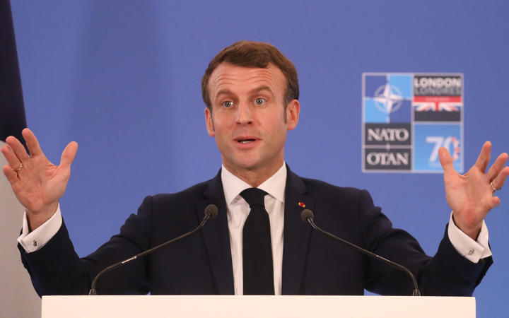 France's President Emmanuel Macron gives a press conference at the NATO summit at the Grove hotel in Watford, northeast of London on December 4, 2019. (Photo by LUDOVIC MARIN / AFP)