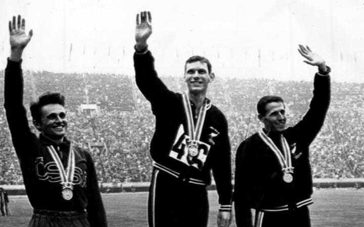 Peter Snell, centre, won gold in the men's 1500 metres in the 1964 Tokyo Olympics. Pictured on the podium with, at left, Josef Odlozil (Cze) and bronze-medal winner John Davies (NZL).