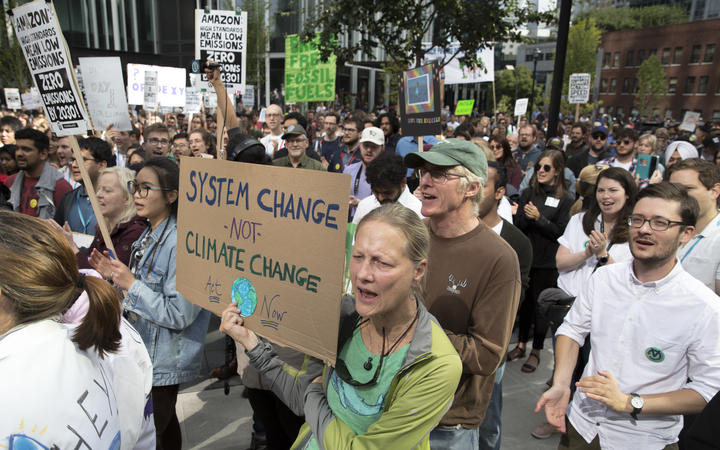 Amazon Employees for Climate Justice lead a walk out and rally at the company's headquarters to demand that leaders take action on climate change in Seattle, Washington on September 20, 2019.