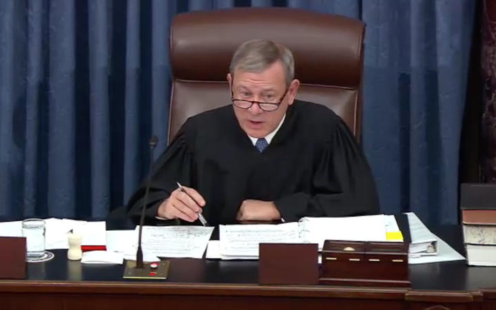 Chief Justice of the United States John G. Roberts, Jr presides as the US Senate considers an amendment to US Senate Resolution 483, during the impeachment trial of US President Donald J Trump.