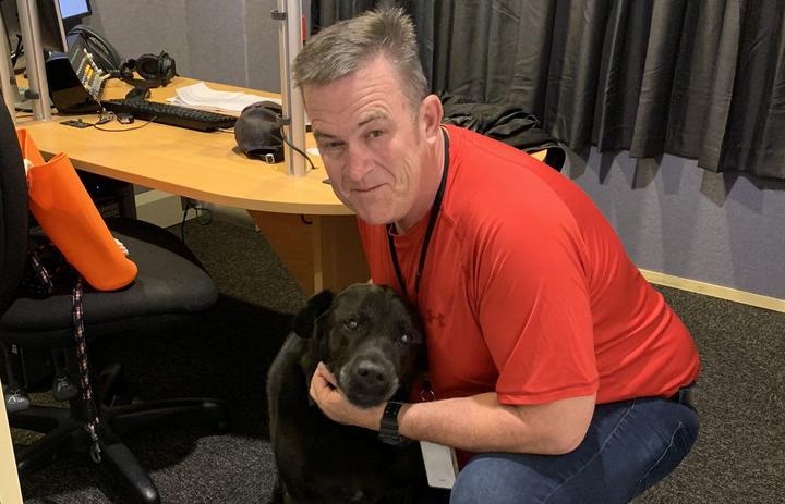 Magic Talk's Sean Plunket and his dog pax in the studio. 