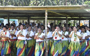 Women and men of Rotuma perform a traditional dance for guests on Rotuma day.