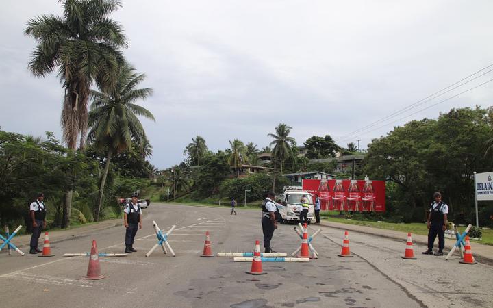 Fiji police man checkpoints into Suva