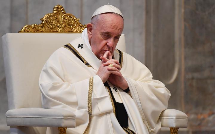 Pope Francis gathers his thoughts during Easter Sunday Mass on April 12, 2020 behind closed doors at St. Peter's Basilica in The Vatican.
