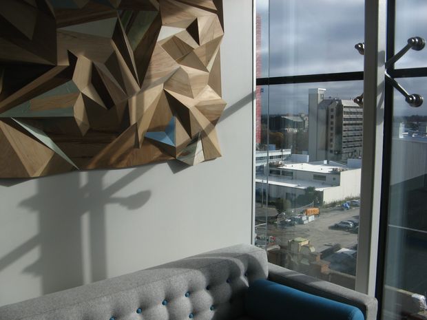 Rekindle June Christchurch company Ganellen commissioned a recycled wood installation for their penthouse office