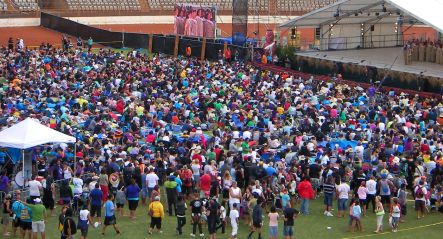 The large crowd watching events on stage.