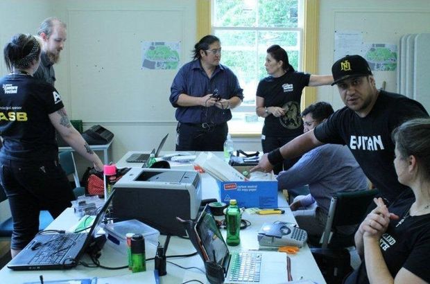 In charge Event Manager Eric Ngan centre heads production team