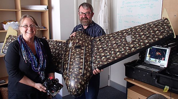 Barbara Breen and John Robertson with the SwampFox unmanned aerial vehicle