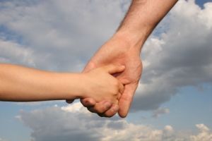 Parenting parent child holding hands blue cloudy sky ex RF Stock