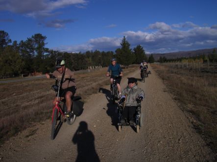 Are we there yet? Mike Gourley and Trish Harris on the trail, with Adrienne Jansen and the tandem pair of Eddy and Penny in tow.