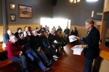Out of Town - Like Minds manager Gordon Hudson talks with members of a Taranaki rural community