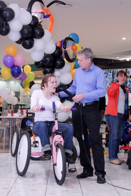 Brooke Haverkort with trike designer dad, Chris.