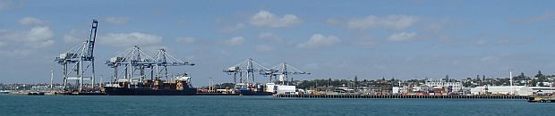 Ports of Auckland wharf with container ship