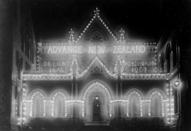 Cover Parliament Buildings Wellington illuminated to celebrate Dominion Day