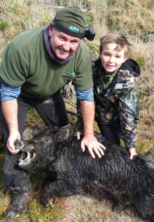 Adam and son and pig