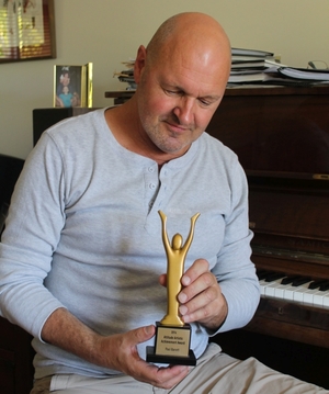 Taming Tourettes Paul Barrett and his award