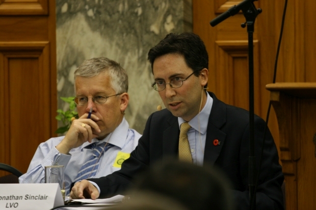 Prof Robert Ayson listens to the British High Commissioner H E Jonathan Sinclair