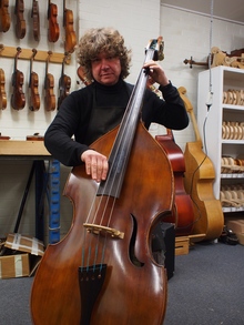 Paul Davies playing a semi acoustic Spur double bass