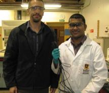 Johan Verbeek and Velram Mohan with thin strands of bioplastic