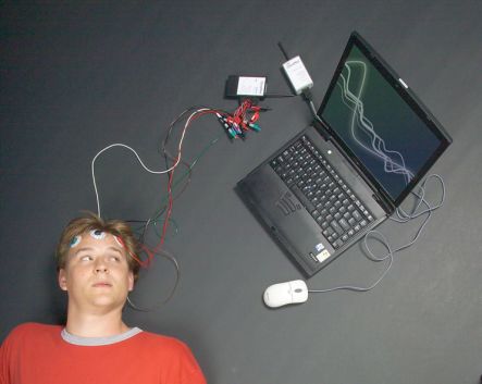 A student wired up for sleep research