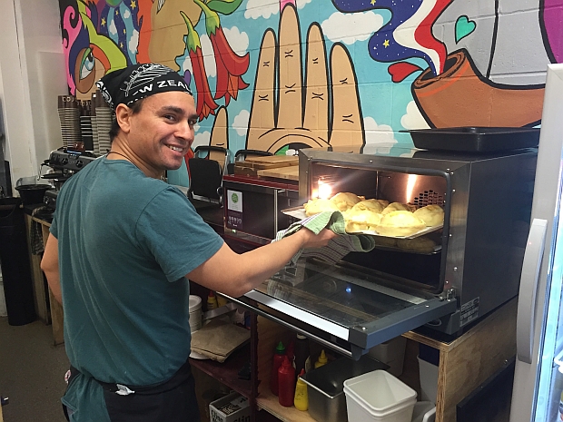 Rodrigo baking empanadas