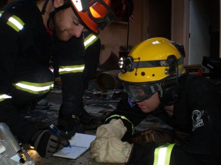 USAR team make notes on a rescue