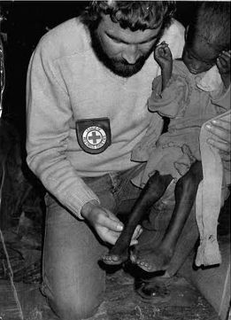 McKerrow Bob McKerrow with a severely malnourished child in Wollo province Ethiopia in