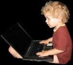 A small child using a computer