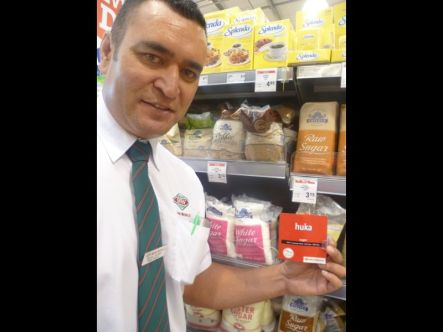 Damon Jakeman Manager Tokoroa New World holding product signage