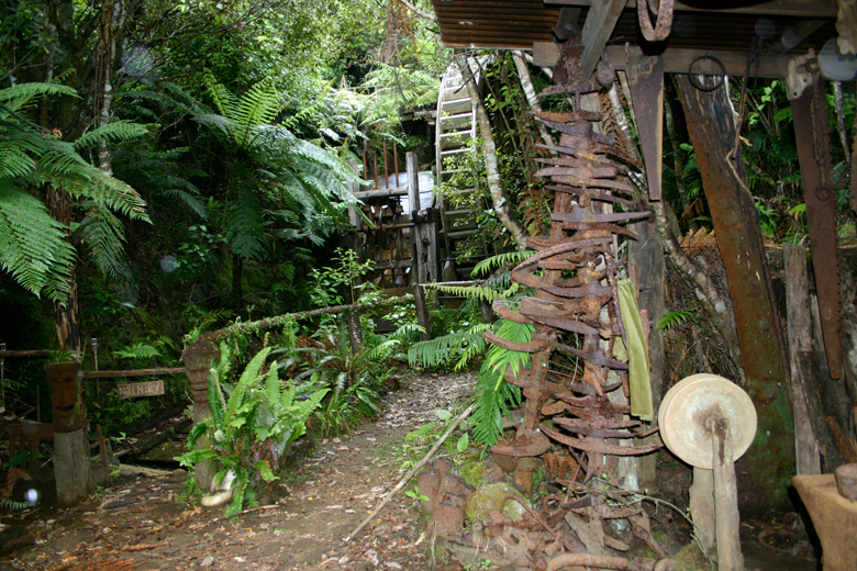 Looking from the blacksmith s forge to a waterwheel